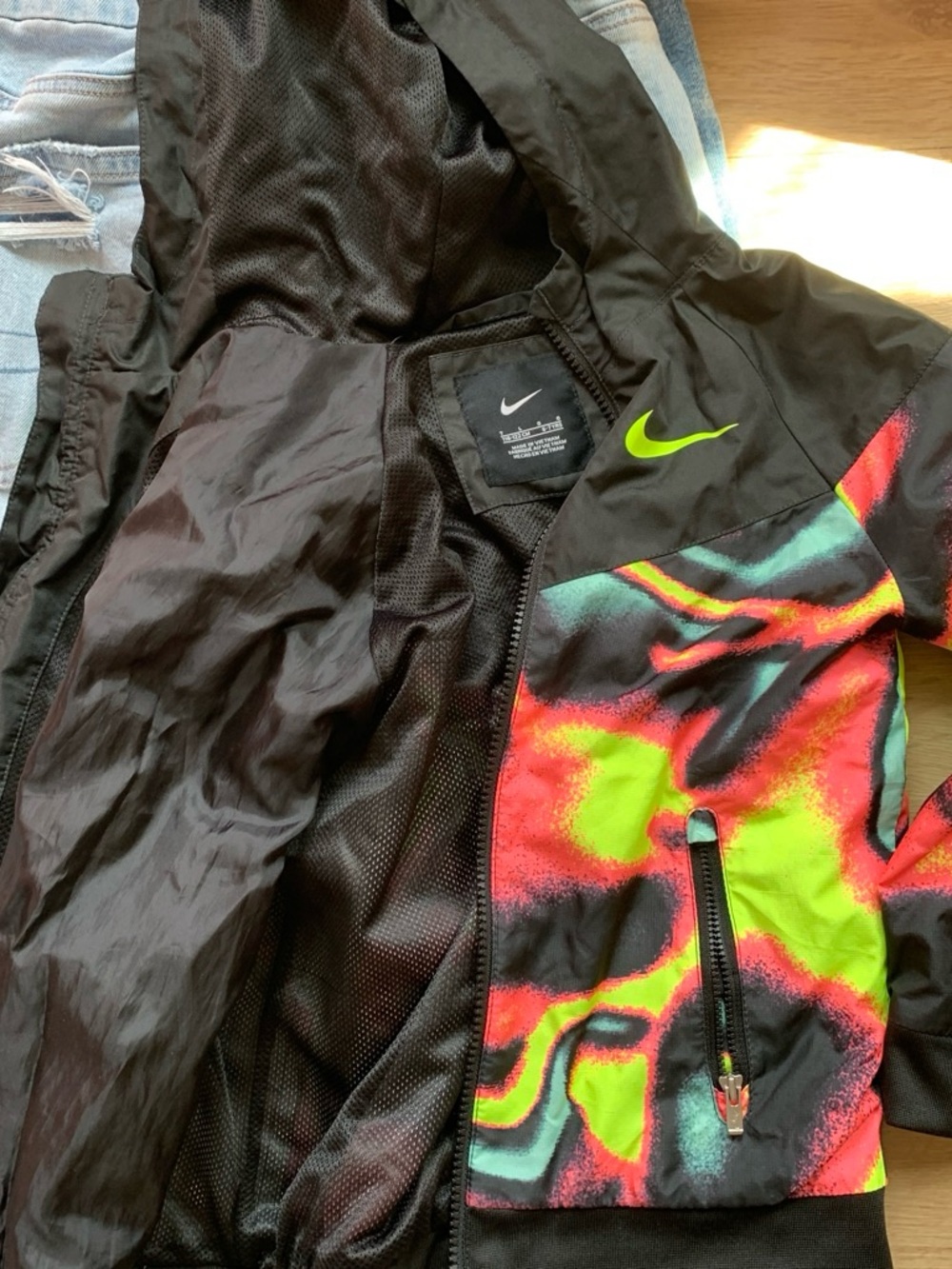 Nike Kids Black Jacket with Neon Green and Pink Swirl Accents